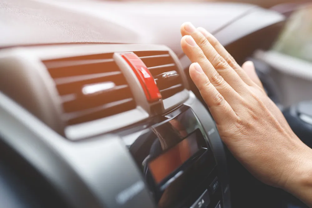 How does the car's AC system work?